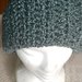 Cappello di lana bouclè di color verde perlato caldo e morbido realizzato a uncinetto a mezza maglia alta 