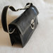 Borsa donna Baguette in pelle nera multitasche con cerniera chiusura clips style