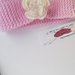 Fascia bambina rosa con fiore  in pura lana merinos 100% lavorata a mano