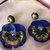 Fantastici orecchini artigianali in resina Panse’ Blu 
