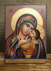 Icona dipinta interamente a mano con colori acrilici su tavola di legno massello. 