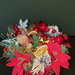 Piccolo cesto di frutta e fiori natalizio 