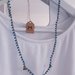 Collana stile rosario con cristalli e cuori di Ematite 