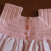 Vestitino rosa con corpino in filo e gonna in stoffa con bordo in tulle bianco
