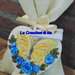Bomboniera farfalla con rose a forma di cuore in ceramica 