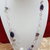 collana lunga viola con agata piatta e mezzi cristalli