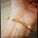 bracciale  con roselline oro e perle