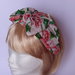 Fascia per capelli in tessuto a fantasia floreale montata su cerchietto rigido lunga 150 cm. e modellabile per diversi usi