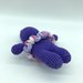 Ippopotamo viola amigurumi con fiocco e tutù fatto a mano all’uncinetto