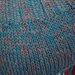 Mantella turchese in cotone con frange lavorata a maglia