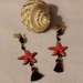 ORECCHINI pendenti con stella marina rossa e nappina nera