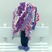 Sirenetta amigurumi con riccioli colorati fatta a mano all’uncinetto