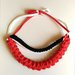 Collana girocollo multifilo realizzata ad uncinetto in fettuccia di lycra e di cotone nei colori rosso bianco e nero