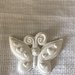 Farfalla sorridente con cuori in gesso ceramico profumato per il fai da te