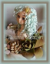 bambola centrotavola in porcellana fredda -fata dei fiori