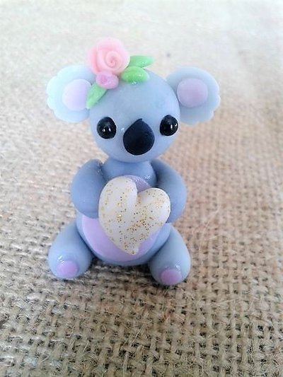 Koala in pasta di mais, piccolo cake topper, bomboniere Koala in pasta di mais, piccolo cake topper, bomboniere