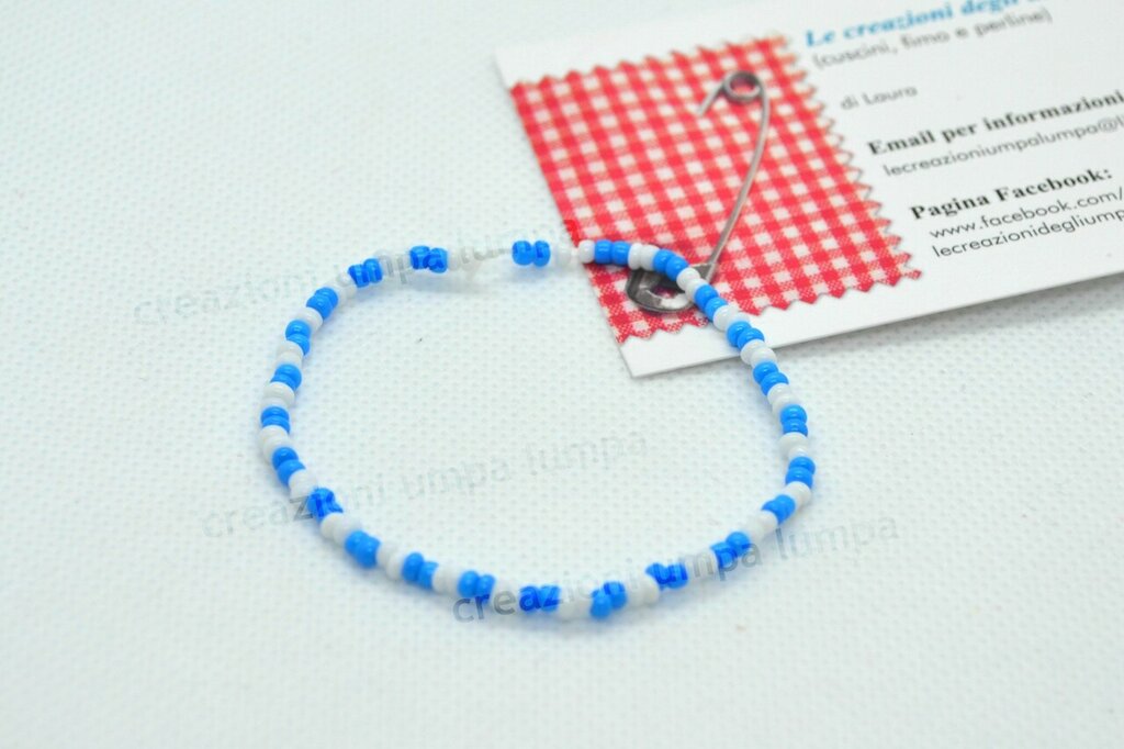 Bracciale a cuore con perline dorate e madreperla