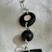 Lunghi orecchini manufatti bianchi e neri rettangoli a righe pallina nera lente con monachella