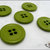 5 grandi bottoni mm.27, in poliestere lucido,  colore verde chiaro, attaccatura a 4 fori 