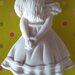 Alice in gesso