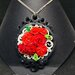 Ciondolo cameo con rose rosse