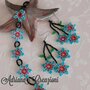 Parure Salacia con bracciale e orecchini  