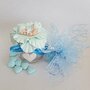 Barattolo neonato su petalo fiore battesimo azzurro