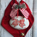 Decorazioni natalizie/Fiocco in velluto rosso con targa ovale in ceramica