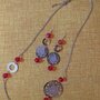Orecchini e collana in metallo argentato nichel free con filigrana color argento e oro perle in cristallo sfaccettato colore rosso