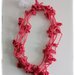 Collana lana rosa carico con fiorellini