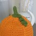 Cappellino in lana forma zucca . Halloween