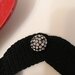 Girocollo lana nera bottone gioiello