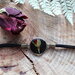 bracciale nero con rosa