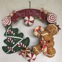 NATALE - ghirlanda gingerbread con tanti dolcetti , albero di Natale e scritta Merry Christmas