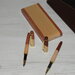 set di penne in legno con porta penne