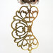Orecchini donna pendenti all'uncinetto e metallo color oro