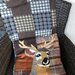 cuscino quillow cervo - un cuscino con dentro un plaid