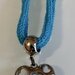 Collana azzurra tricottin