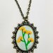 Collana con cameo di orchidee gialle fatta a mano 