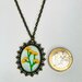 Collana con cameo di orchidee gialle fatta a mano 