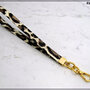 Cinturino staccabile da polso,  lungo 21 Cm. in similpelle leopardata finiture colore oro