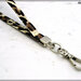 Cinturino staccabile da polso,  lungo 21 Cm. in similpelle leopardata finiture colore argento 