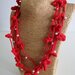 Collana cotone rosso con fiori e perline
