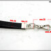 Cinturino staccabile da polso,  lungo 21 Cm. in vero cuoio nero inciso, finiture colore argento 