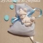 20 sacchettini porta confetti in rigatino di cotone per nascita o battesimo con calamita a forma di  neonato in polvere di ceramica