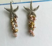 Orecchini stella marina grappoletti perle di fiume 