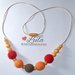 Collana allattamento oro arancione rosso dentizione massaggiagengive bijoux neomamma idea regalo nascita battesimo baby shower