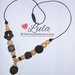 Collana allattamento oro nero fiore dentizione massaggiagengive bijoux neomamma idea regalo nascita battesimo baby shower