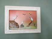 uccellini al tramonto collage di sassi su legno dipinto a mano