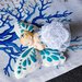 Farfalla con bimba realizzati in gesso ceramico 